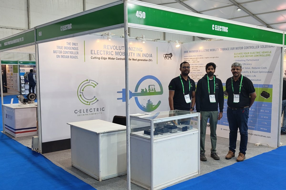 The C-Electric team at their stand at SIAT Expo 2024, with controllers on display
