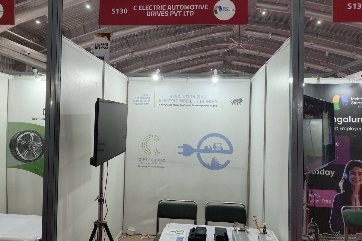 The C-Electric stand S130 in the MeitY Startup Hub pavilion at TiE Global Summit Bengaluru 2024, with controllers on display